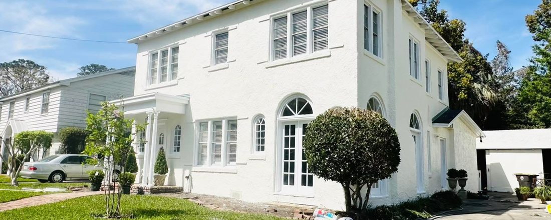 Historic two-story stucco exterior repaint
