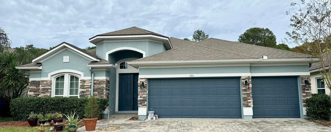 Blue-gray exterior repaint, completed